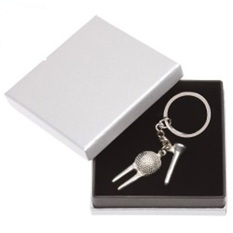Porte-clefs en métal serti d'un tee sur www.routedugolf.com