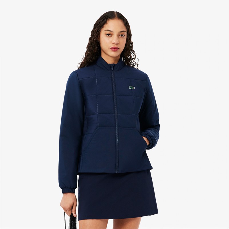 Lacoste Veste Femme BF4582 – Blouson de golf déperlant et élégant avec protection UV | Route du Golf